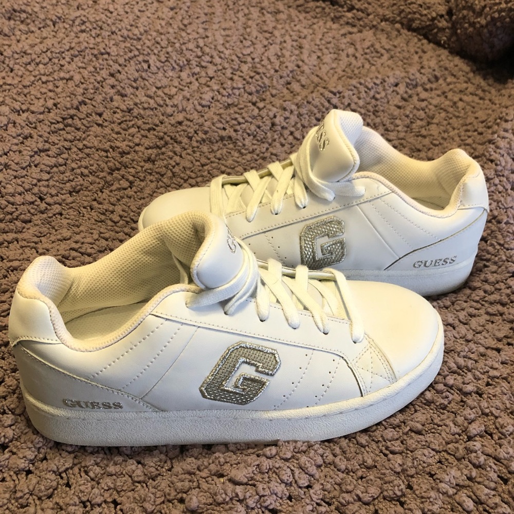 Women’s white and silver Guess sneakers.  Size 7, worn once indoors